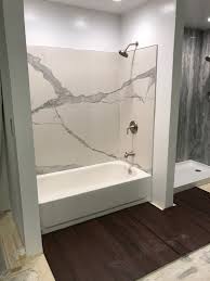 Curava S Breakthrough Line Of Shower Surrounds Brings The Reliability Of Two Great Materials To Your Home Shower Surround Panels Shower Surround Shower Panels