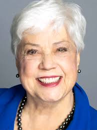 PEGGY DOUGHERTY MARCUS