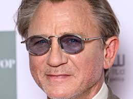 Daniel Craig looks worlds away from Bond role as he makes rare red carpet  appearance