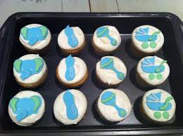 Adorable elephant rosette cupcake toppers are featured in gray and bashful blue polka dots. Baby Boy Elephant Cupcakes Marvaliss Cupcakes
