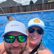 I am doing a tailgate for a 100 people and will be serving pulled pork  sandwiches. How many pounds of raw butt should I cook?