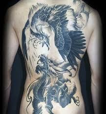 Bird Tattoos For Guys On Back 40 Phoenix Back Tattoo Designs For Men Flaming Bird Ideas Phoenix Back Tattoo Phoenix Tattoo Back Tattoo