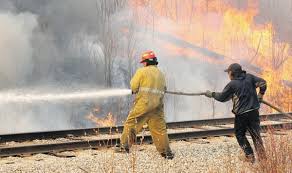 One firefighter is dead after a blaze along the. Wildfires Burn Across Alberta