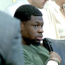 Wall machete murder suspect to remain jailed while awaiting trial