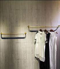 You can hang your clothes or wall decor while using the racks to store keys and gloves. Clothing Store Display Rack Upper Wall Gold Hanging Clothes Pole Hanger Wall Hanging Display Rack Hangers Racks Aliexpress