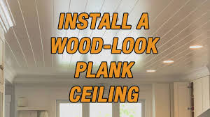 How To Install A Wood Look Plank Ceiling Plank Ceiling Floating Ceiling Diy Ceiling