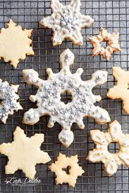 These homemade sugar cookies are so soft and have the best, creamy frosting with hints of almond. Christmas Sugar Cookies Recipe Cafe Delites