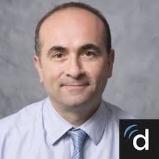 Dr. Joshua T. August, MD