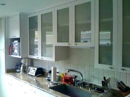white kitchen cabinets with frosted