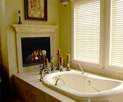 The cost and time for installing a fireplace in a bathroom can range from only a few hundred dollars and a d.i.y. Fireplace In The Bathroom Bathroom Design Bathroom Fireplace Elegant Bathroom Design