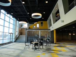 School Lobby Addition At New Life Academy Woodbury Mn Curtainwall Carpet Tile Circular Ceiling Clouds Black Out Ce Lobby Design Concrete Floors Architect