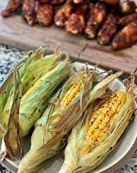 Step 2 preheat a smoker to 250 degrees f (120 degrees c). Smoked Corn On The Cob The Cookin Chicks