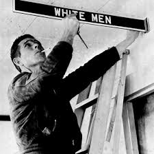 Vintage Everyday | A workman removes a restroom sign at Montgomery  Municipal Airport on Jan. 5, 1962, in compliance with a federal court order  banning... | Instagram