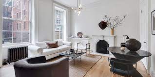 Nate berkus glass top round end table coffee table with brass edges. Nate Berkus And Jeremiah Brent Are Listing Their Greenwich Village Apartment Architectural Digest