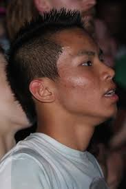 Near ten, singer/guitarist Billy Lunn walked onstage, shirtless,  "strawberry blonde" tattooed across