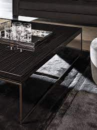 Henn&hart metal 36' round glass top coffee table in black and bronze. Calder Bronze Coffee Tables En