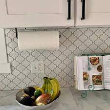 You can choose a paper towel holder that sits on a base. Paper Towel Holder Under Cabinet Or Wall Mount Metal Hardware And Shelf Brackets Made In The Usa