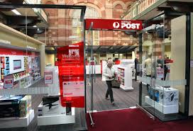 Australia Post Officially Opened Tasmania S First Postal Superstore In Its 127 Year Old Post Office Building In Laun Old Post Office Office Building Glass Cube