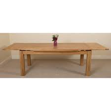 An extending dining table and chairs are ideal for rooms where space may be at a premium. Richmond 6 10 Seater Large Oak Extendable Dining Table Oak Furniture King