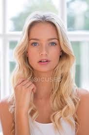 This condition can cause single or, less commonly, multiple white patches on the hair. Woman With Blonde Hair Looking At Camera Daylight Happy Stock Photo 157569890