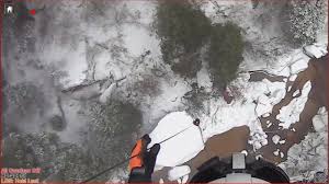 man rescued from quicksand in snowstorm