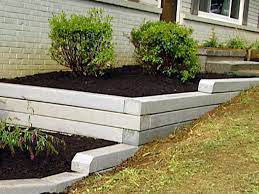 How To Install A Timber Retaining Wall Landscaping Retaining Walls Landscape Timbers Landscape Timber Edging