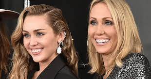 This is miley cyrus and her parents, billy ray and tish. Miley Cyrus Mom Reacts To Breakup Instagram Pictures