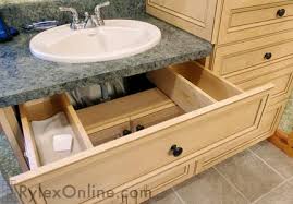 drawer wraps around sink's plumbing