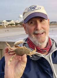 A goalie and a ref try to help their father in the stands as a fight breaks  out at a hockey game. VIDEO: http://bit.ly/1ggqtnn