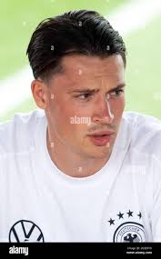 Herzogenaurach, Germany. 26th June, 2021. Football: EM, Autograph session  Germany at the Adi Dassler sports ground. Germany's Robin Koch signs  autographs. Credit: Federico Gambarini/dpa