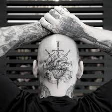 They can be placed practically anywhere one wants or even worked into existing body art. Heart Head Knife Tattoo By Bang Bang