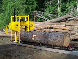 Portable compressed log maker : Log Master Portable Saw Blade Manufacturer Inc Nacogdoches Tx