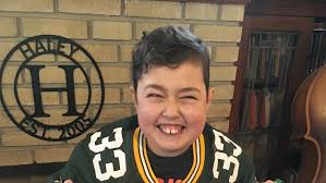 Burges high school, el paso, tx. Aaron Jones Surprises 12 Year Old Boy Who Designed Cleats For Childhood Cancer Awareness