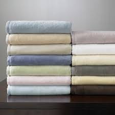 The luxurious blanket is crafted from stonewashed cotton. St Moritz By Sferra Plush Blanket Sferra Blue Blanket