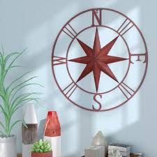 Inspired by the charming wall art found in antique stores throughout coastal new england, this antique compass rose wall décor lends your space a splash of nautical appeal. Compass Rose Metal Wall Art Wayfair