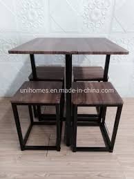 If you have a small dining room or even a small space without a bonafide dining room, there are tricks to maximize square footage and create a dining area. Unihomes 5 Piece Wood Steel Space Saving Dining Room Table Set With Stools China Dining Table With Stools Breakfast Table With Stools Made In China Com
