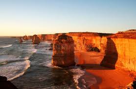 Twelve Apostles At Sunset The Magnificent Twelve Apostles Victoria Australia Ad Magnificent Victoria Sunse Vacation Guide Travel And Tourism Ocean