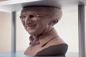 Sculpture of Tim Cook crushed by hydraulic press