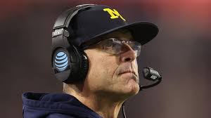 Michigan coach Jim Harbaugh to serve out suspension