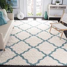 Add a sense of texture to a modern living room with this attractive shag rug or create a focal point in a busy room, the possibilities are endless with a cozy shag rug. Amazon Com Safavieh Dallas Shag Collection Sgd257j Trellis Non Shedding Living Room Bedroom Dining Room Entryway Plush 1 5 Inch Thick Area Rug 8 6 X 12 Ivory Light Blue Furniture Decor
