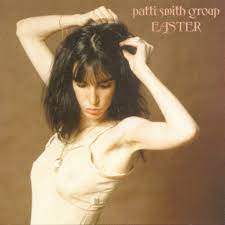 Patti smith (third right, arms outstretched) leads her band during a tribute to her late husband, guitarist fred 'sonic' smith, at central park summerstage in new york on sept. Patti Smith Group Easter Amazon Com Music