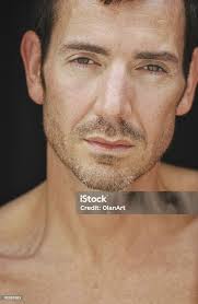 Foto de Rosto Masculino Com Barba Luz e mais fotos de stock de Adulto