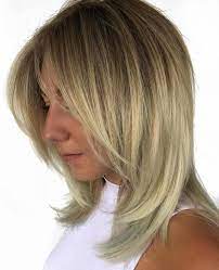 In particular, layers are very helpful for women who have very thick hair because layers take off extra hair weight that can make it difficult for them to quickly style their hair. 60 Fun And Flattering Medium Hairstyles For Women Hair Styles Choppy Mid Length Hair Medium Hair Styles