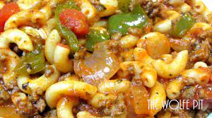 A fancy american chop suey made with fresh basil and rosemary, crispy bacon, cream, peppers and onions, red pepper flakes, and mozzarella and new englanders love american chop suey. American Chop Suey Recipe How To Make Classic American Chop Suey Youtube