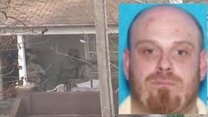 SWAT team arrests cop killer suspect, places him in fallen officer's  handcuffs