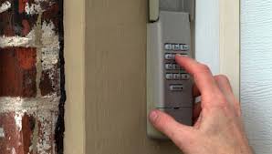 How To Reset Garage Door Keypad Without Enter Button With Images Garage Door Keypad Genie Garage Door Garage Doors