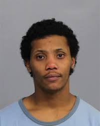 Shooting suspect identified, 'armed and dangerous'