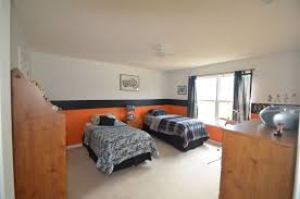 Bedroom Two Is Painted In Harley Davidson Colors And Is A Nice Size At 12 X14 Home Decor Decor Bedroom