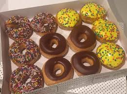 Dunkin' chocolate frosted donut w/ sprinkles. Glazed And Confused Dunkin Donuts Vs Krispy Kreme Cavsconnect