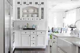 Dark gray cabinets and white spring granite countertops matched very well. White Mini Subway Tiles Transitional Kitchen Rikki Snyder Photography